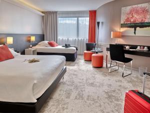 Postel nebo postele na pokoji v ubytování Best Western Plus Metz Technopole