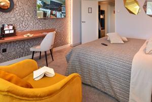 Postel nebo postele na pokoji v ubytování Best Western Plus Metz Technopole