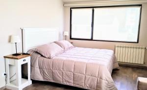 Ένα ή περισσότερα κρεβάτια σε δωμάτιο στο Skyview 440