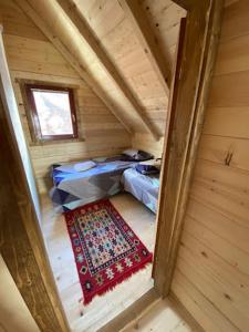 an overhead view of a room in a wooden house at Villa Klodi in Boge