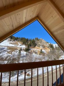 a view of a mountain from a window at Villa Klodi in Boge