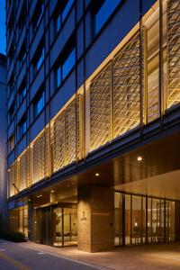 an external view of a building at night at THE KITANO HOTEL TOKYO in Tokyo