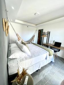 Ένα ή περισσότερα κρεβάτια σε δωμάτιο στο Star house Guriú