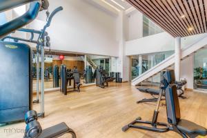 a gym with treadmills and cardio equipment in a building at Spacious & comfortable Apt. w/pool by mYYcasa P-2 in Mexico City
