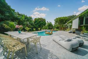 Πισίνα στο ή κοντά στο New Villa Jungle Paradise Heated Pool BBQ Soccer