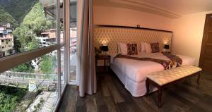 Letto o letti in una camera di Jaya Machu Picchu Boutique Hotel