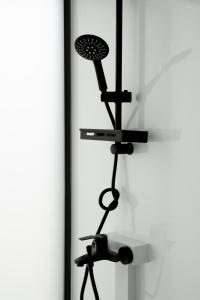 a microphone and camera on a stand in a room at Field Tiny Home - Fruit & Sunset in Hall