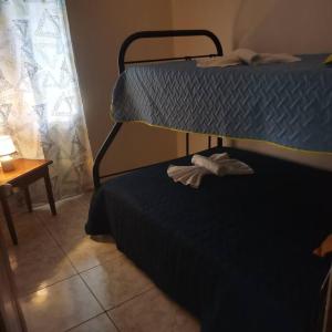 Postel nebo postele na pokoji v ubytování CañoNegro CasaBlanca