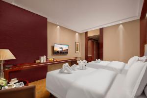 TV a/nebo společenská místnost v ubytování New Jiuzhai Hotel