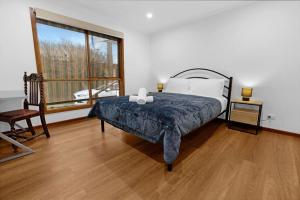 Ένα ή περισσότερα κρεβάτια σε δωμάτιο στο Hillside Estate