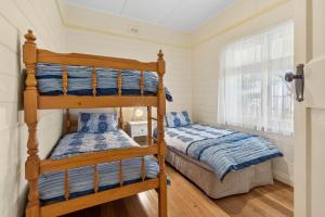 Кровать или кровати в номере Maison Cottage