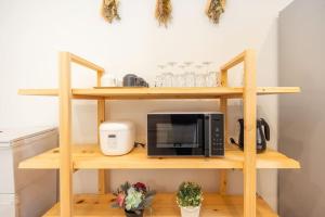 Una cocina o kitchenette en 東京新築85平米駅徒歩6分最大8名無料駐車場東京上野秋葉原駅直通