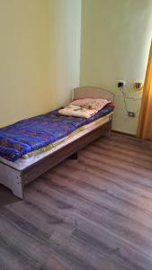 Postel nebo postele na pokoji v ubytování Ainur