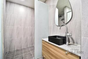Koupelna v ubytování Brown Dot Hotel Guun