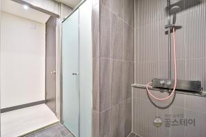 Koupelna v ubytování Brown Dot Hotel Guun