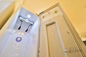 Koupelna v ubytování Brown Dot Hotel Guun