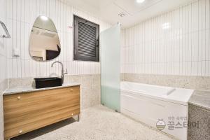Koupelna v ubytování Brown Dot Hotel Guun