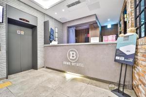 Certifikát, hodnocení, plakát nebo jiný dokument vystavený v ubytování Brown Dot Hotel Guun