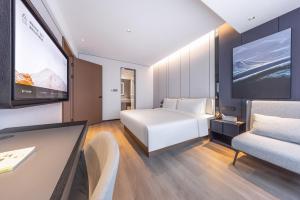 TV in/ali zabaviščno središče v nastanitvi Atour Hotel Jinan Shandong International Convention and Exhibition Center Ikea