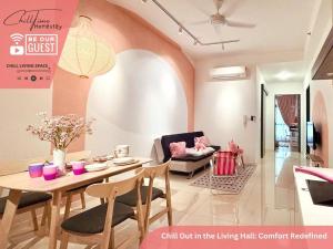 a living room with a table and chairs and a dining room at Paradigm Mall JohorBahru- Hyatt Palace 5GWifi Netflix by ChillTime Homestay in Johor Bahru