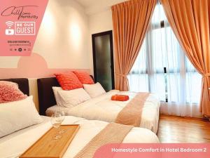 two beds in a hotel room with orange curtains at Paradigm Mall JohorBahru- Hyatt Palace 5GWifi Netflix by ChillTime Homestay in Johor Bahru