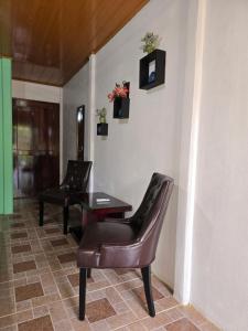 Posezení v ubytování Tortuguero Hill Rooms