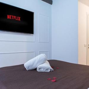 Postel nebo postele na pokoji v ubytování Vicolo delle Belle Suite