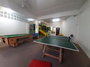 a room with a ping pong table in it at Unit 606 Seabrook in Margate