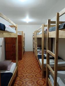 Postel nebo postele na pokoji v ubytování Aloha Hostel Siargao