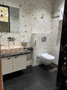 Koupelna v ubytování Hotel Sajanshree