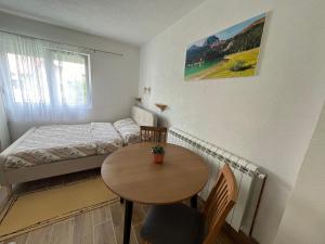 Un ou plusieurs lits dans un hébergement de l'établissement Apartment Phillip Studio