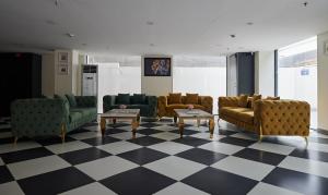 Posezení v ubytování Deventure Sarovar Portico Patel Nagar