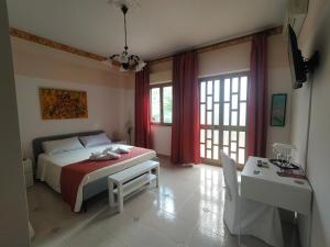 A bed or beds in a room at Il Siriaco