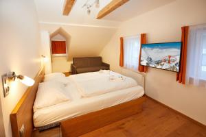 Posteľ alebo postele v izbe v ubytovaní Residence AlpenHeart