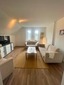 Posezení v ubytování Schönes Apartment nähe Düsseldorf