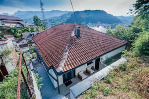 an overhead view of a house with a red roof at Boutique Home Konjic in Konjic