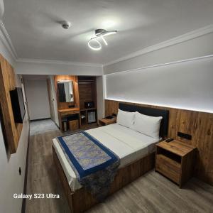 Postel nebo postele na pokoji v ubytování old hatay hotel
