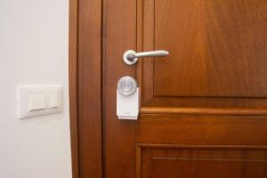 a wooden door with a lock on it at Finestra Sul Borgo in Trevignano Romano +18 photos