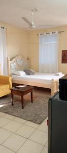 En eller flere senge i et værelse på WayneHomes