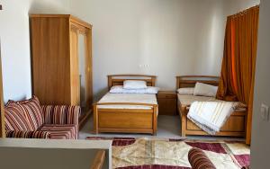 Postel nebo postele na pokoji v ubytování Marassi Pent house Golf View