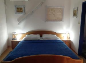 Postel nebo postele na pokoji v ubytování Guest House Green Corner Supetarska Draga