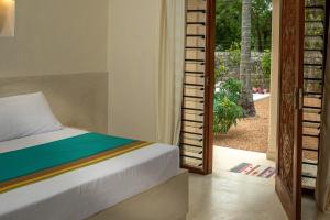 Afbeelding uit fotogalerij van Villa Cleo bed and breakfast in Watamu