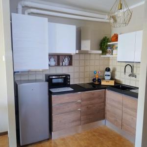 Kuchyň nebo kuchyňský kout v ubytování Casa Mabello