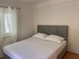 Postel nebo postele na pokoji v ubytování Ana Exclusive Apartments
