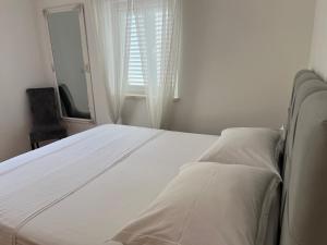 Postel nebo postele na pokoji v ubytování Ana Exclusive Apartments