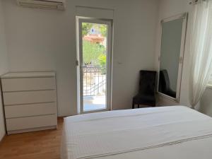Postel nebo postele na pokoji v ubytování Ana Exclusive Apartments