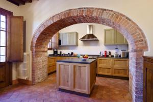 Η κουζίνα ή μικρή κουζίνα στο Vivaia - Arceno Rentals Club