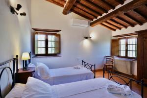 Ένα ή περισσότερα κρεβάτια σε δωμάτιο στο Vivaia - Arceno Rentals Club +31 φωτογραφίες