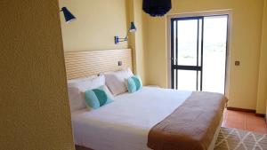 Cama ou camas em um quarto em WOT Sintra Ocean