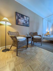 Posezení v ubytování Hotel-Maison Am Olivaer Platz + 37 fotografií